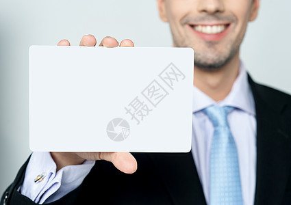 展示名片的男子营业员商务老板生意人男性人士秘书公司卡片商业图片
