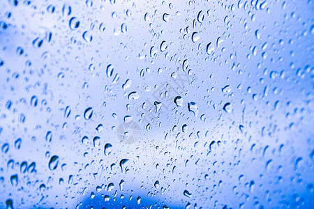 水滴背景玻璃环境青色液体天气反射雨滴窗户气泡下雨图片