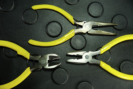 钳子工具钳工钢弯机锯齿管道机器维修承包商技术员工人图片