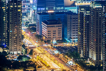 现代城市之夜 有摩天大楼和轻型汽车旅游建筑景观场景地标建造公寓金融天际商业图片