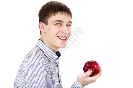 使用苹果的青少年食物乐趣小伙子蔬菜男性小吃快乐享受学生青年图片