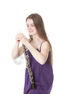 白色背景下有双眼的女童裙子演员青年艺术家音乐会青少年艺术女性木管交响乐图片