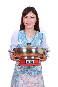 配有Suki锅的家庭主妇沸腾炊具厨师工作食物妻子主妇家庭盘子勺子图片