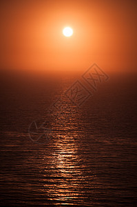 日落海洋假期天气天堂蓝色旅行太阳地平线海浪海滩图片