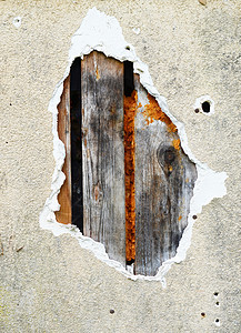 墙壁中的空洞石膏差距木头水泥图片