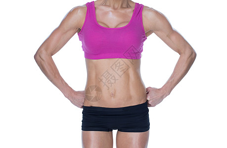 女性造体者在中段臀部上摆手姿势护理倾斜文胸身体体质运动服健美肌肉竞技黑色图片