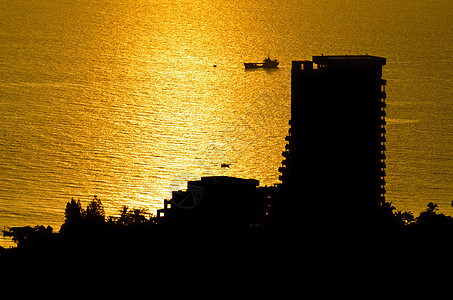 日出时 月光观华欣市风景景点橙子建筑全景支撑太阳城市阴影海洋图片