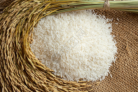 大米在布罗普麻袋帆布种子水稻白米解雇黄色素食木头米粒图片
