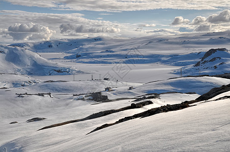 挪威 Trolltunga电线杆建筑物高山全景风景岩石房屋山脉阴影丘陵图片