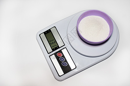 在数字厨房规模上加糖的碗重量绿色医疗金属食物插图浴室展示木板白色图片