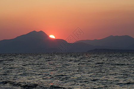 爱琴海日落蓝色天空射线海浪阳光假期魔法海洋乐趣反射图片