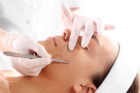 整形外科 美术诊所的一位妇女缺口老化剥皮表情治疗剥落美容院皱纹药品美化背景图片