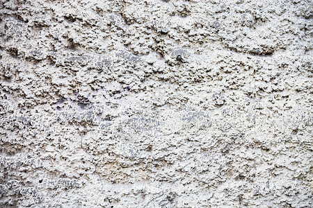 充满丰富和各种纹理的白墙建筑砂浆粉饰美白材料石灰石墙水泥风化裂缝背景图片