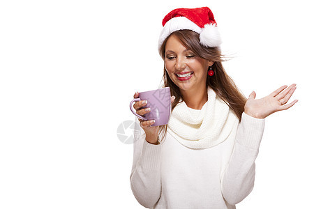穿着圣诞老人帽子的冷酷年轻女人 喝着咖啡茶女士季节食物杯子节日巧克力派对饮料微笑庆典图片