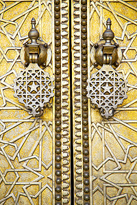 黄金外墙和安全垫上金色绿色的棕色土黑铜金子钥匙出口保障金属建筑隐私入口挂锁建筑学图片