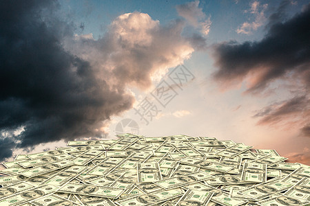 成堆美元的复合图象日出多云金融阳光货币经济日落财富天空银行业图片