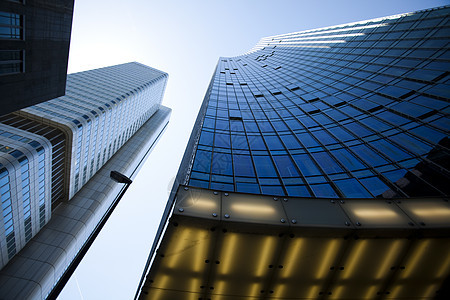 蓝天背景的办公楼建房摩天大楼景观建筑学玻璃蓝色商业镜子天空窗户建筑图片