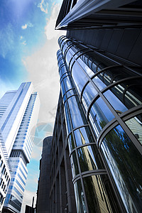 蓝天背景的办公楼建房景观城市技术建造反射金融市中心建筑学房地产玻璃图片
