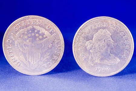 1美元银硬币自由银行业赚钱货币商业静物蓝色自由女神金属繁荣背景图片