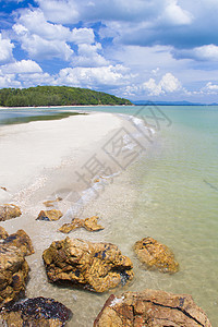泰国的海滩石头叶子天堂丛林海岸热带岩石日落太阳海浪图片