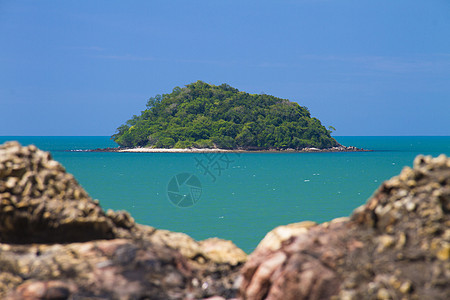 泰国的海滩蓝色阳光日落海浪石头冲浪海洋海岸岩石椰子图片