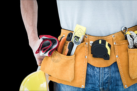 技术员的复合图象 腰上带工具带工人卷尺领班工艺人修理工工作手工具职业安全帽黄色图片