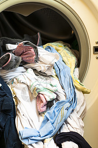 洗衣机中的洗衣房机器技术牛仔裤洗衣店家务衣服玻璃地面打扫垫圈图片