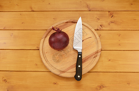 红洋葱 刀子在砍板上图片