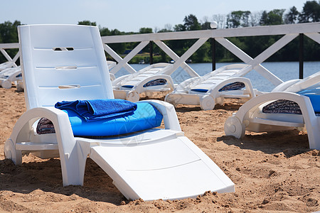 湖边海滩贵妃毛巾阳光身体护理假期银行座位空气沙滩图片