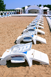 湖边海滩生活方式日光假期太阳护理银行空气贵妃躺椅座位图片