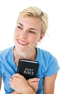 带着圣经的美丽笑笑金发女人图片