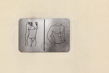 墙壁上厕所或洗手间男女标志符号图片