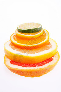 大量多彩的切片柑橘类水果紧闭图片