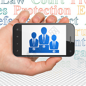 法律概念 手持智能手机 商业团队在展出图片