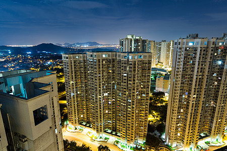 香港住宅楼夜间办公时间晚上建筑学景观财产公寓民众城市建筑窗户天线密度图片