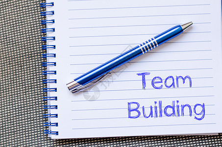 团队建筑用笔记本写作微笑商业咨询作坊解决方案会议工作员工合作领导者图片
