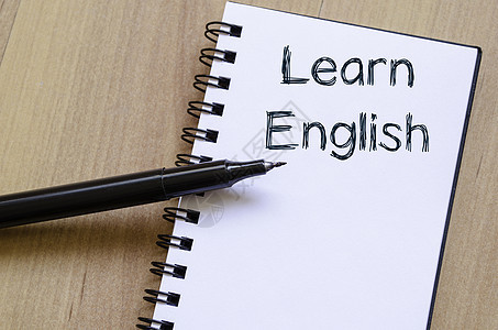 在笔记本上学习英文写作教学学校翻译教育国际英语说话训练知识语言图片