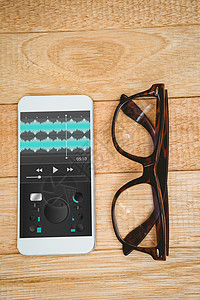 音乐应用复合图像木头电脑手机眼镜电话白色触摸屏技术屏幕桌子背景图片