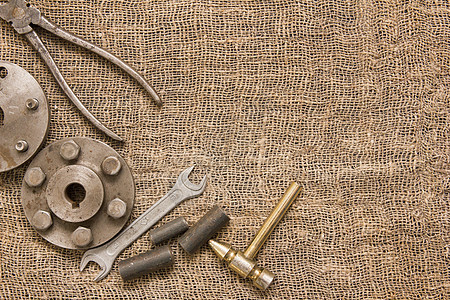 古老的生锈工具和粗织布细节金属扳手工作团体机器车轮滑轮宏观测量工程图片