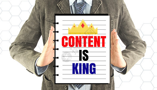 拥有笔记本文字内容的商务人士为王商业概念社论入境营销蓝色国王社会博客品牌创造力系统在线的高清图片素材