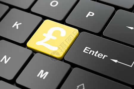 计算机键盘背景上的货币概念英镑债务信用价格资金电子商务宝藏市场贷款银行业投资图片