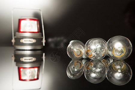 黑色背景的灯泡玻璃技术活力灯笼塑料反射效率力量辉光能源图片