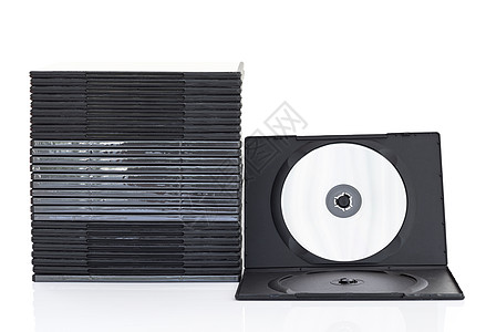 白色背景上带光盘的 DVD 盒包装磁盘盒子视频射线软件案件音乐蓝光信封图片
