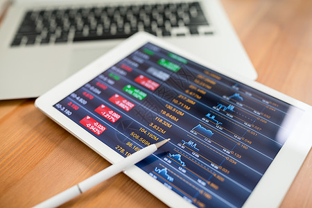 数字平板电脑业务图表和图表统计桌子技术屏幕报告数据战略金融生长投资图片
