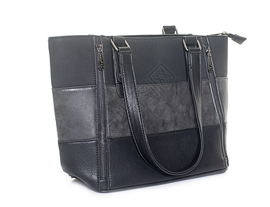 工作室的手提包女士钱包皮革篮子配饰黑色背景图片