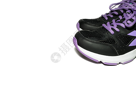 喷水器健康运动运动鞋紫色白色黑色背景图片