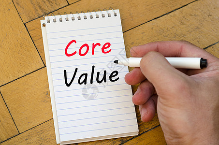 笔记本上的核心价值文字概念成就指导战略营销顾客团队老师商业文化咨询图片