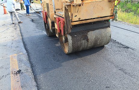 道路建筑工地劳动土地基础设施运输工具陆运工人机器工作沥青图片