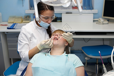 牙医接待处的病人生活方式医生工具诊所医院临床牙科卫生检查微笑图片