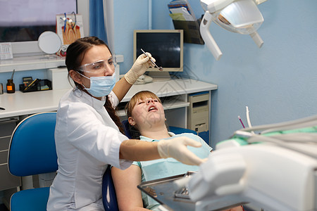 牙医接待处的病人访问医生治疗检查口服牙科女性药品牙齿临床图片